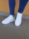 Білі кросівки з кольоровим задником