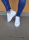 Белые кроссовки с цветным задником