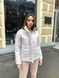 Женская куртка молочного цвета